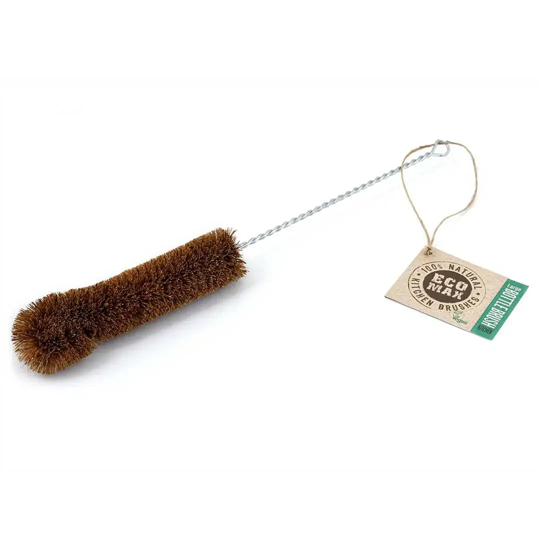 all natural bristle brush with a hanging string and branded label on a white background