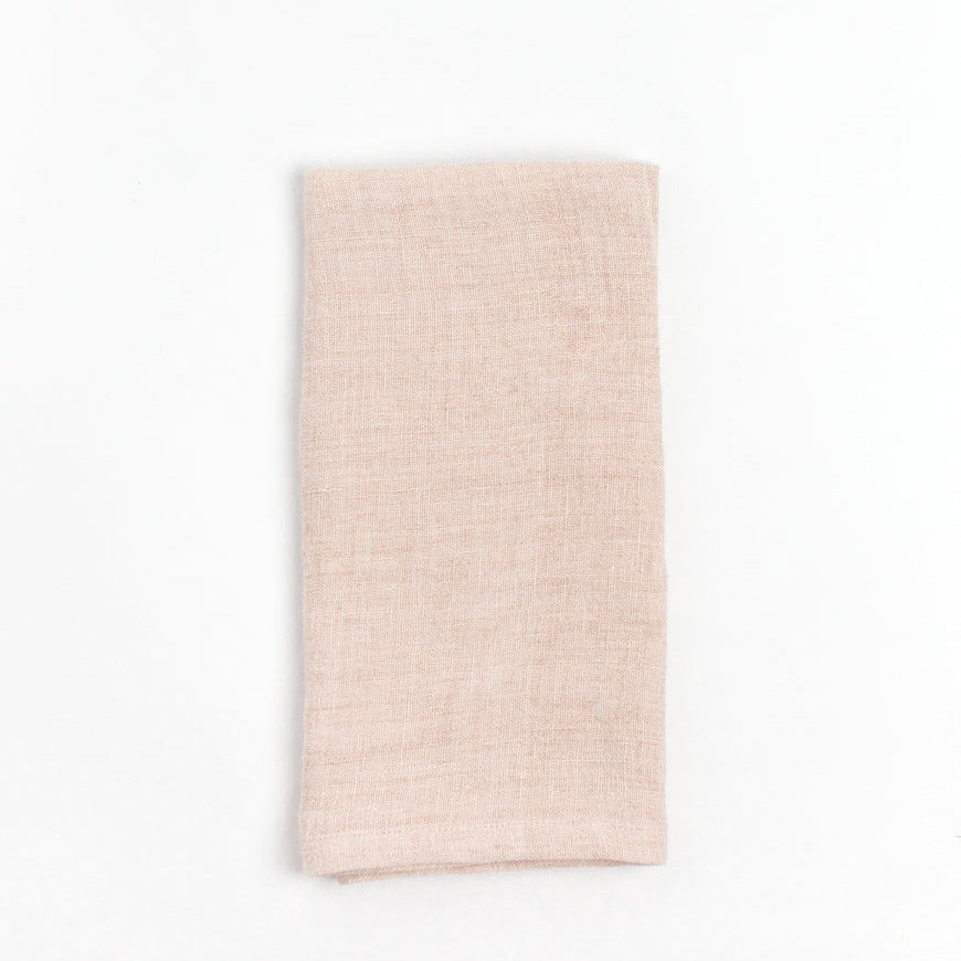 Beige woven fabric on a white background