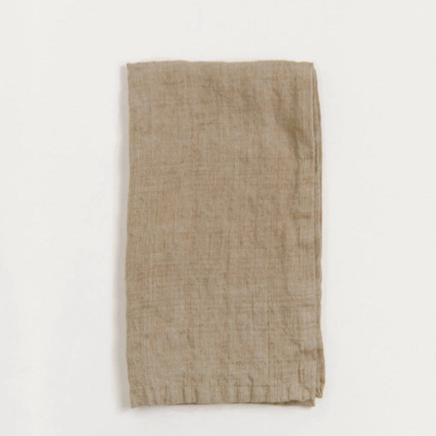 Beige towel on a white background