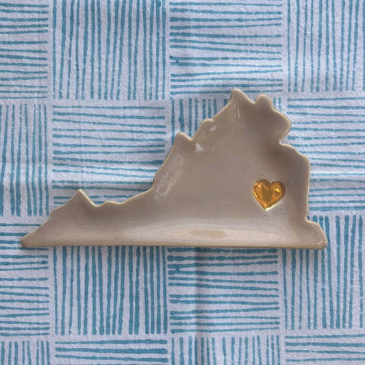 Decorative dish shaped like the state of Virginia with a heart on a space and white checkered tea towel