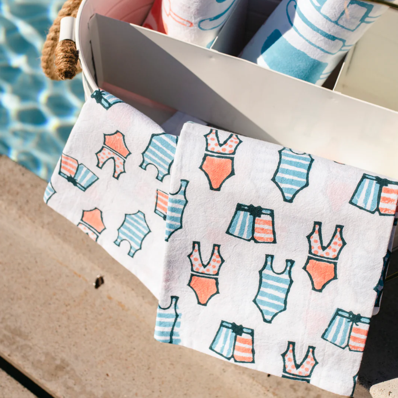 basket with summer pattern tea towels patterns include swimsuits and popsicles