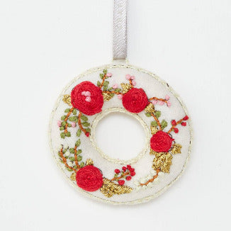 felt wreath with a rose Damascus embroidery on a white background